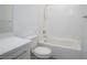 Bright bathroom featuring a clean white tiled shower with white walls at 600 N Carriage Hill Dr # 2174, Las Vegas, NV 89138