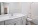 Bright bathroom featuring a modern vanity with white countertop, tub and tiled shower at 600 N Carriage Hill Dr # 2174, Las Vegas, NV 89138