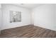 Bright, airy bedroom with a view and wood-look flooring at 600 N Carriage Hill Dr # 2174, Las Vegas, NV 89138