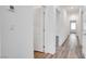 Hallway with hardwood floors and doors at 600 N Carriage Hill Dr # 2174, Las Vegas, NV 89138
