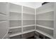 Walk-in pantry with ample shelving for storage, offering a clean and organized space at 600 N Carriage Hill Dr # 2174, Las Vegas, NV 89138