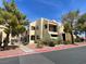 Attractive condo building with balconies and well-maintained landscaping on a sunny day at 601 Cabrillo Cir # 970, Henderson, NV 89015