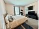 Comfortable bedroom with neutral carpet and a ceiling fan at 6436 Linden St, North Las Vegas, NV 89086