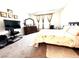Bedroom featuring carpeted floors, neutral walls, a dresser, and a queen-sized bed at 6436 Linden St, North Las Vegas, NV 89086
