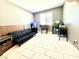 Versatile bonus room with tile flooring and plenty of natural light at 6436 Linden St, North Las Vegas, NV 89086