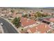 Overhead neighborhood shot showcasing solar panels on multiple homes at 672 Hitchen Post Dr, Henderson, NV 89011