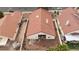Aerial view of backyard, including patio set, and surrounding neighborhood at 672 Hitchen Post Dr, Henderson, NV 89011