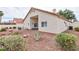 Backyard featuring desert landscaping and a comfortable lounge area at 672 Hitchen Post Dr, Henderson, NV 89011