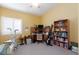 Bright bedroom with vaulted ceilings, a ceiling fan, and ample space for furniture at 672 Hitchen Post Dr, Henderson, NV 89011