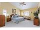 Bright bedroom with neutral carpet and large window at 672 Hitchen Post Dr, Henderson, NV 89011