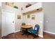 Breakfast nook with hardwood floors, high ceilings, modern lighting, and comfortable seating at 672 Hitchen Post Dr, Henderson, NV 89011