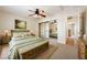 Bedroom with a decorative bench and mirrored closet doors at 6860 Stubblefield Dr, Pahrump, NV 89061
