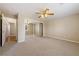 Bedroom boasts mirrored closet doors, neutral carpeting, and a ceiling fan for added comfort at 6860 Stubblefield Dr, Pahrump, NV 89061