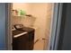 Convenient laundry room with modern washer and dryer set and ample shelving for storage at 7022 Judith River St, North Las Vegas, NV 89084