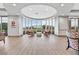 Clubhouse seating area with large windows and views of mountains at 7741 Fruit Dove St, North Las Vegas, NV 89084