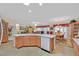 Open-concept kitchen flowing into the dining and living areas, perfect for entertaining and Gathering gatherings at 7741 Fruit Dove St, North Las Vegas, NV 89084