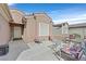 Inviting outdoor patio space with comfortable seating, perfect for relaxation and entertaining guests at 7741 Fruit Dove St, North Las Vegas, NV 89084