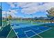 Pickleball courts with net and fencing, offering a fun recreational space at 7741 Fruit Dove St, North Las Vegas, NV 89084