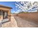 Enclosed backyard features a brick wall and patio with potential for outdoor living and landscaping at 7910 Pandora Sky St # 271, North Las Vegas, NV 89084