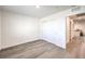 Bedroom featuring wood-look floors, a closet, and doorway view at 7910 Pandora Sky St # 271, North Las Vegas, NV 89084
