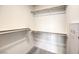 Walk-in closet with built-in shelving, providing ample storage space in this new home at 7910 Pandora Sky St # 271, North Las Vegas, NV 89084