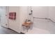 Roll in shower features safety bars, detachable shower head and tile walls at 7910 Pandora Sky St # 271, North Las Vegas, NV 89084