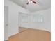 Bright bedroom features hardwood floor, large mirrored closet, ceiling fan, and shuttered windows at 880 Autumn Canyon Way, Henderson, NV 89002
