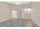 Large bedroom with hardwood floors and doorway to another room at 880 Autumn Canyon Way, Henderson, NV 89002