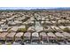 Aerial view of a Primary-planned community with well-maintained streets and landscaping at 9153 Beauchamp Ave, Las Vegas, NV 89148