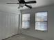 Cozy bedroom with a ceiling fan, closet, and bright windows at 953 Via Gandalfi, Henderson, NV 89011