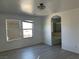 A bright main bedroom features hard surface flooring, a modern light fixture, and ensuite bathroom access at 953 Via Gandalfi, Henderson, NV 89011