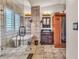 Bathroom featuring a sauna, standalone tub, and tiled floor at 9768 Northern Dancer Dr, Las Vegas, NV 89117
