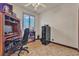 Bedroom with a desk, a chair, and a black filing cabinet with a window at 9768 Northern Dancer Dr, Las Vegas, NV 89117