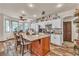 Spacious kitchen with a large island, modern appliances, and ample cabinet space at 9768 Northern Dancer Dr, Las Vegas, NV 89117