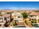 An aerial view of a two-story home in a residential neighborhood surrounded by mountains at 9807 Sage Canyon St, Las Vegas, NV 89178