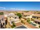 An aerial view of a two-story home in a residential neighborhood with a pool at 9807 Sage Canyon St, Las Vegas, NV 89178