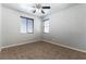 Bright bedroom with tile flooring, large windows, and neutral walls offering a calming atmosphere at 9807 Sage Canyon St, Las Vegas, NV 89178