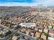 A scenic aerial view of a planned community, highlighting the property's convenient location near the Desert Oasis High School at 9967 Pipestone St, Las Vegas, NV 89141