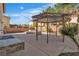 Backyard with outdoor kitchen, covered gazebo and fountain at 9967 Pipestone St, Las Vegas, NV 89141