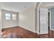 Bedroom features wood-look flooring and an open door to the walk-in closet at 9967 Pipestone St, Las Vegas, NV 89141