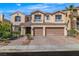 Charming two-story home with a two-car garage and beautifully landscaped front yard in a sunny neighborhood at 9967 Pipestone St, Las Vegas, NV 89141