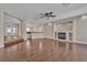 Spacious living room features hardwood floors and a cozy fireplace, great for entertaining at 9967 Pipestone St, Las Vegas, NV 89141
