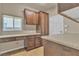 Bright office featuring custom cabinets, desk, and tile flooring at 9967 Pipestone St, Las Vegas, NV 89141