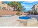 Inviting backyard with pool, spa, outdoor kitchen and pergola, perfect for relaxation and entertaining at 9967 Pipestone St, Las Vegas, NV 89141