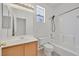 Bathroom featuring single vanity with a shower and bathtub combination at 100 Beaver Falls Ave, Las Vegas, NV 89123