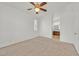 Bedroom featuring carpeted floors, a ceiling fan, and a neutral color scheme at 100 Beaver Falls Ave, Las Vegas, NV 89123