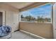 Cozy balcony with seating and neighborhood views for outdoor relaxation at 1012 Domnus Ln # 105, Las Vegas, NV 89144