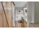 Bathroom features a modern vanity, a walk-in shower and a barn door at 1012 Domnus Ln # 105, Las Vegas, NV 89144