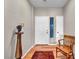 Inviting entryway with hardwood floors, decorative rug, and stylish accents at 1012 Domnus Ln # 105, Las Vegas, NV 89144