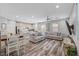 Spacious living area with stainless appliances and a seamless flow to the backyard at 10397 Skye Canyon Falls Ave, Las Vegas, NV 89166